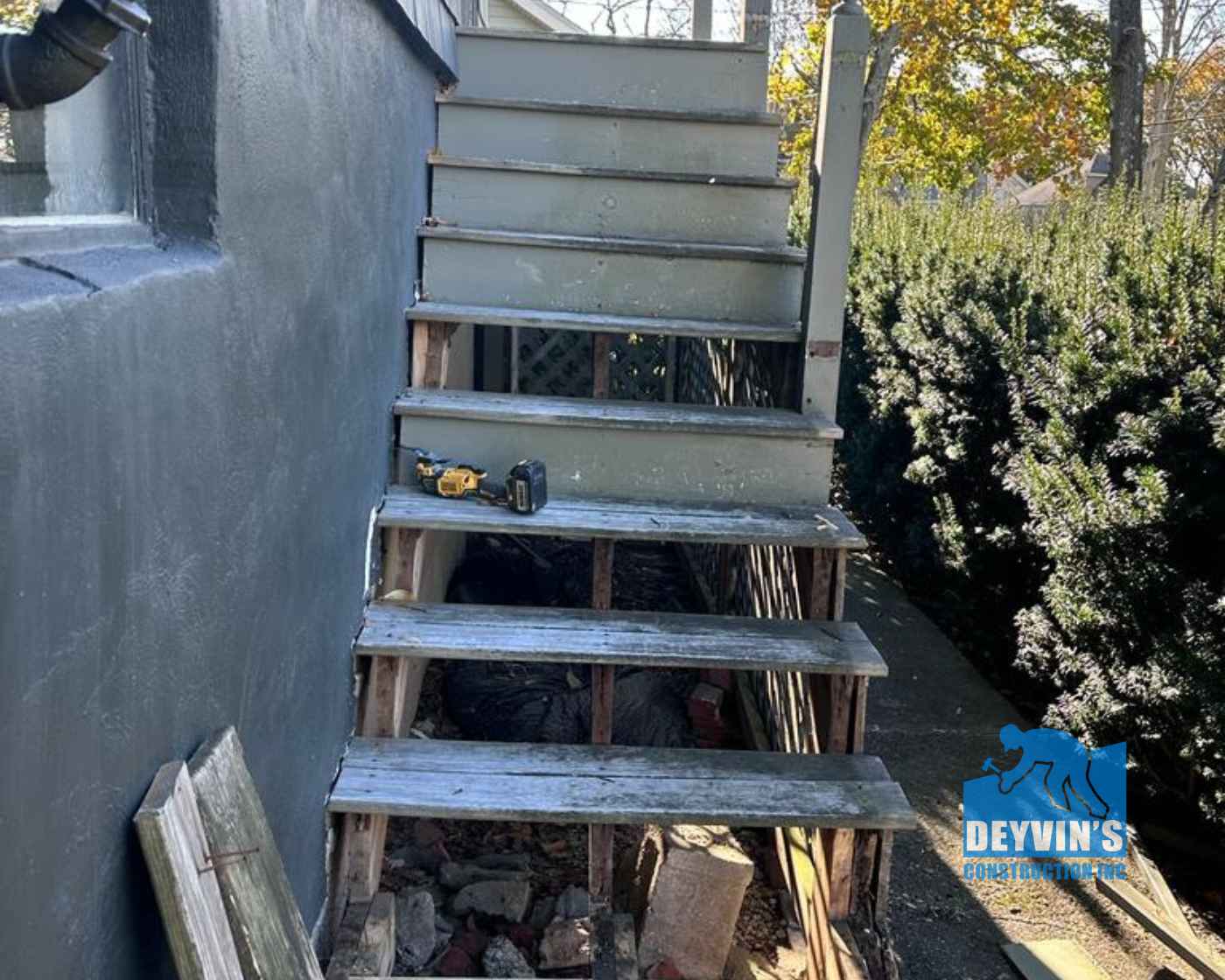 staircase railing repair and cedar painting